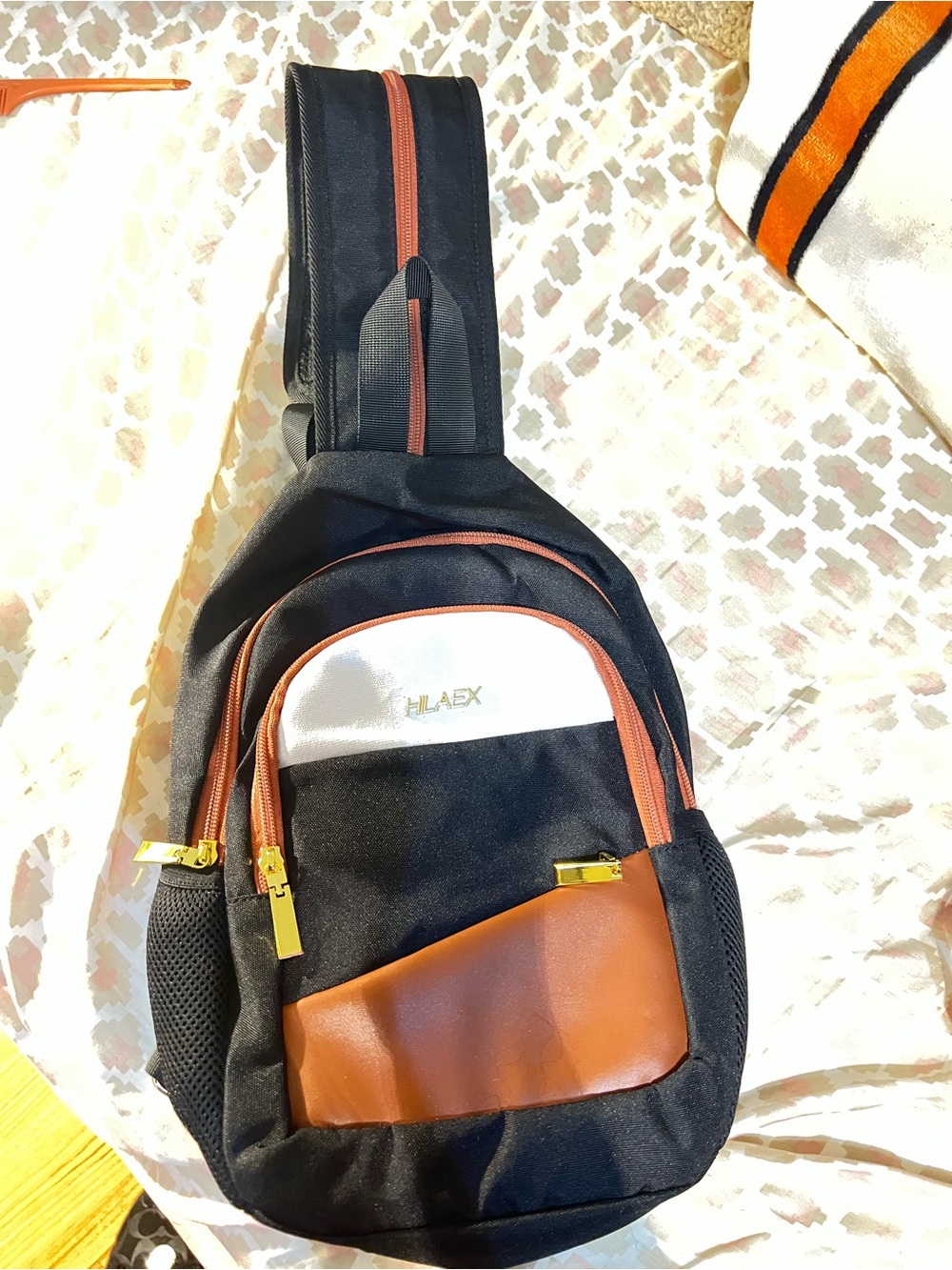 Black Sling Belt Bag with Brown Accents